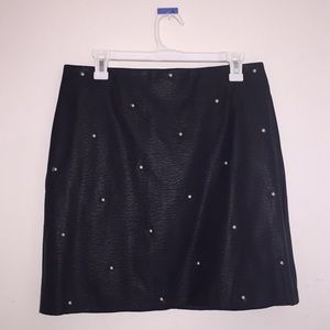 Faux black leather studded skirt